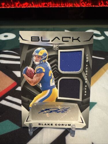2024 Panini Black - Rookie Signature Materials #RSM-19 Blake Corum /99